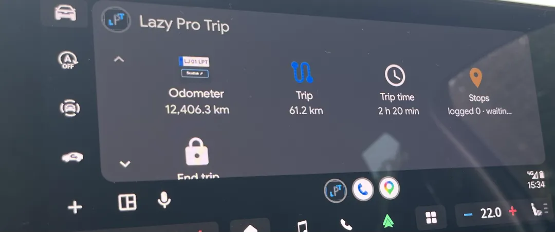 Car display running Android Auto with Lazy Pro Trip: odometer, trip distance, trip time, stops and the End trip button